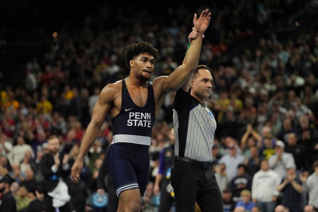 Penn State's Carter Starocci reacts after defeating Northern Iowa's Parker Keckeisen during a 184-pound match in the finals at the NCAA wrestling championship, Saturday, March 22, 2025, in Philadelphia. (AP Photo/Matt Rourke)